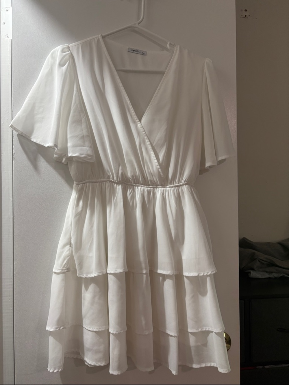 Brand: Unknown — White Tiered Wrap Mini Dress with Flutter Sleeves